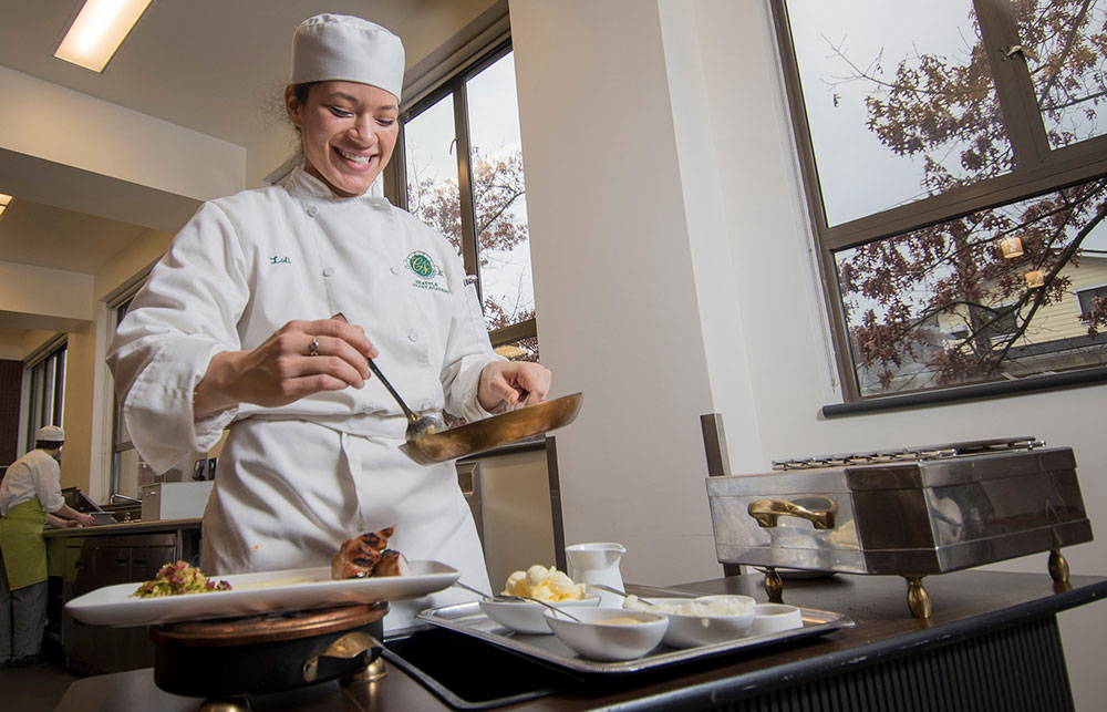 Culinary Arts student making a dish